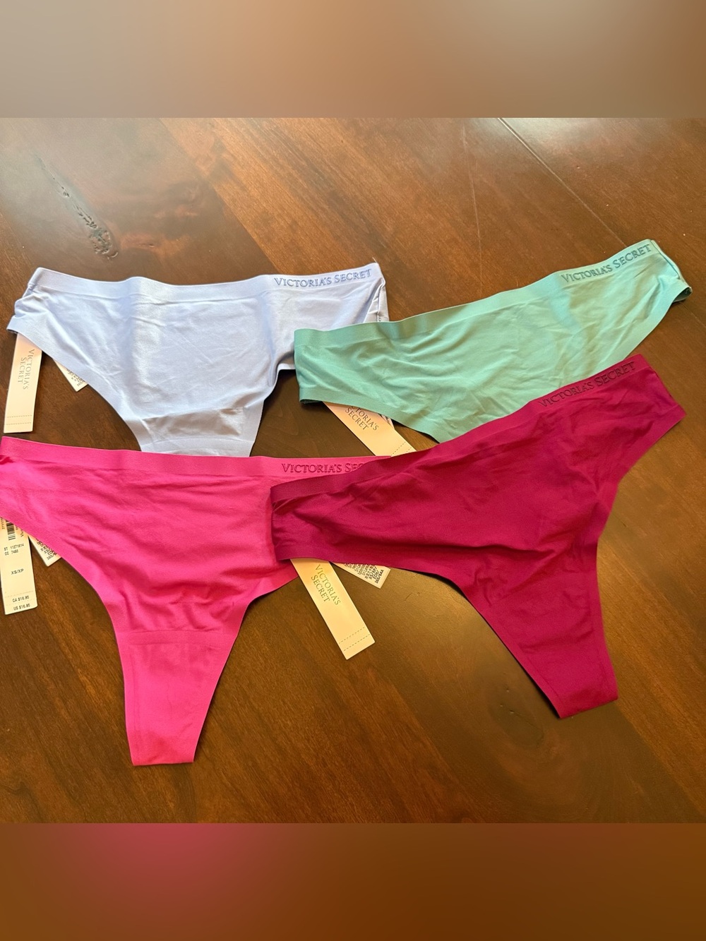 Lot of 4 Victoria' Secret Body by Victoria mid rise thong panties XS